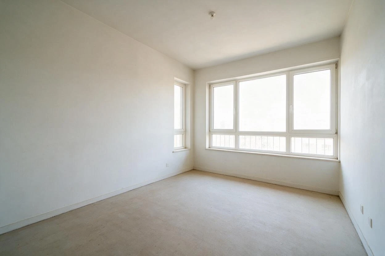 Virtual staging before and after: turning an empty living room into a warm, fully furnished space buyers can picture themselves in (before photo)